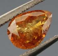 One of a kind! .33ct amber Diamond
