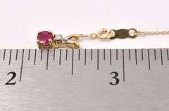 Elegant Ruby Pendant Necklace In 14K Yellow Gold