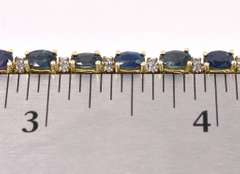 Elegant Blue Sapphire Tennis Bracelet In 14K Yellow Gold