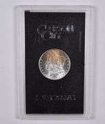 1884-CC Morgan Silver Dollar GSA Hoard Great Color Tone
