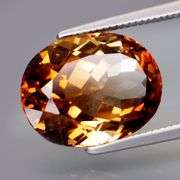 Stunning 8.32ct 14x10mm eye clean Imperial Topaz