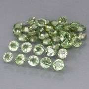 Awesome 4.95ct diamond cut GREEN Sapphire set
