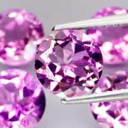 Stunning 8.60ct round cut Bolivian Amethyst set