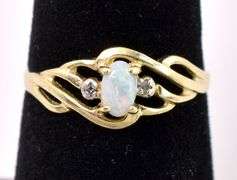 Fine Opal And Diamond Ring In Yellow Gold