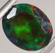 Rainbow flashing! 1.24ct black Opal