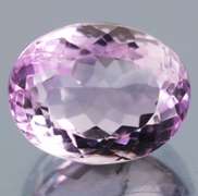 Glittering oval cut 13.65ct violet pink Amethyst