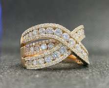 TWO TONE CROSS-OVER ROUND DIAMOND RING IN 14K YELLOW AND ROSE GOLD (2.45 CARATS T.W.)