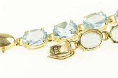 14K Yellow Gold Oval Blue Topaz Classic Vintage Tennis Bracelet