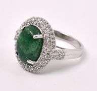 Brilliant 6.50CTS Oval Shaped Cabochon-Cut Emerald & 1.50CTW White Sapphire Ring in Sterling Silver