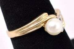 Alluring Pearl And Diamond Ring In Yellow Gold