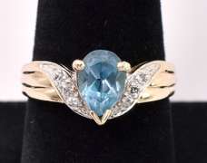 Cute Blue Topaz Ring In 14K Yellow Gold