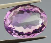 Halo flashing 10.83ct unheated Bolivian Amethyst
