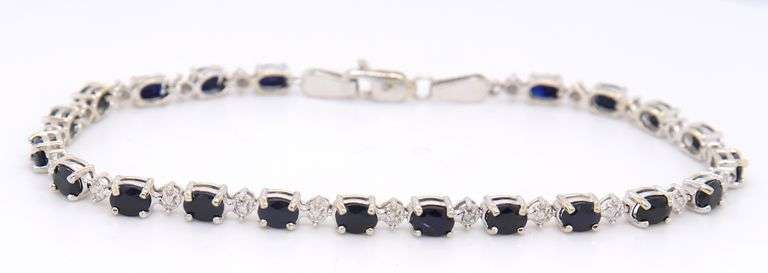 Attractive White Gold Blue Sapphire and Diamond Tennis Bracelet
