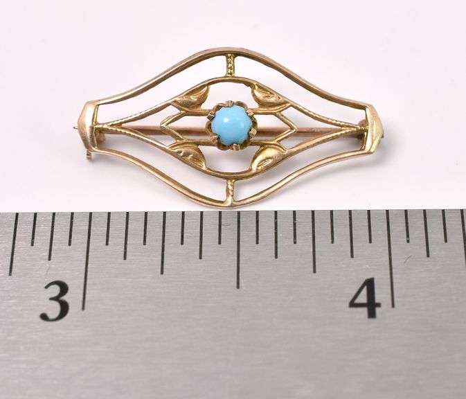 Adorable Turquoise Pin In Yellow Gold
