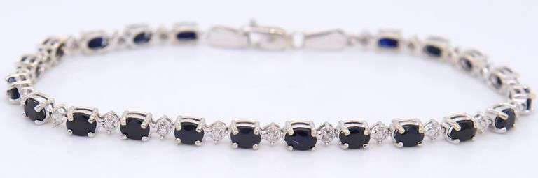 Attractive White Gold Blue Sapphire and Diamond Tennis Bracelet