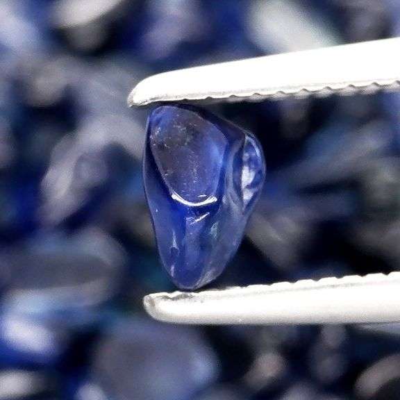 Really heavy and richly colored 30.90ct Sapphire set