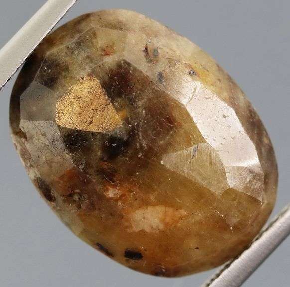 Super unique calico 13.03ct faceted Sapphire