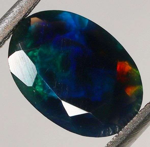Eye catching 1.02ct floral patterned Black Opal