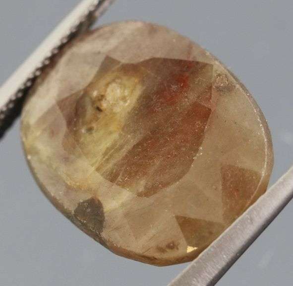 UNTREATED! Shimmering 13.97ct earth toned faceted Sapphire