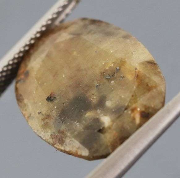 Super unique calico 13.03ct faceted Sapphire