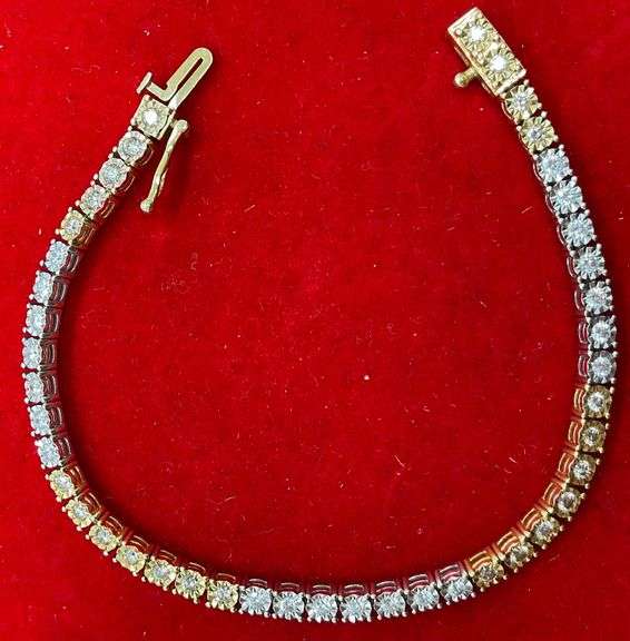 CERTIFIED 14K WHITE AND YELLOW GOLD DIAMOND TENNIS BRACELET. 1.25 CARAT