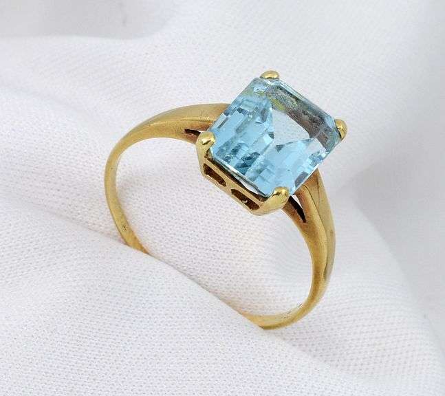 Tasteful Blue Topaz Solitaire