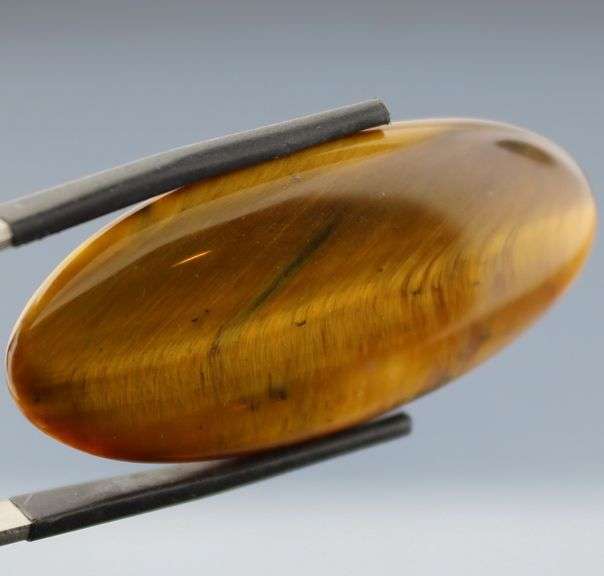 Full body shimmer! 49.27ct Golden Tiger Eye cabochon