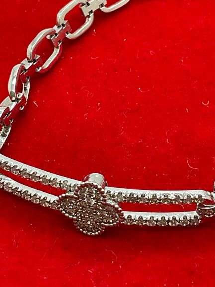 CERTIFIED BRAND NEW 14K GOLD AND DIAMOND SLIDING CLOVER BRACELET