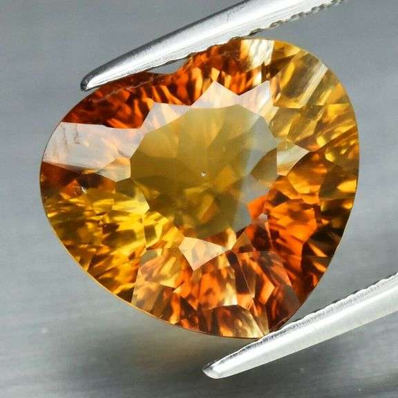 Concave flashing 6.41ct amber Imperial Topaz