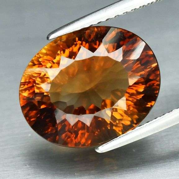 Fiery flashing 7.82ct amber Imperial Topaz