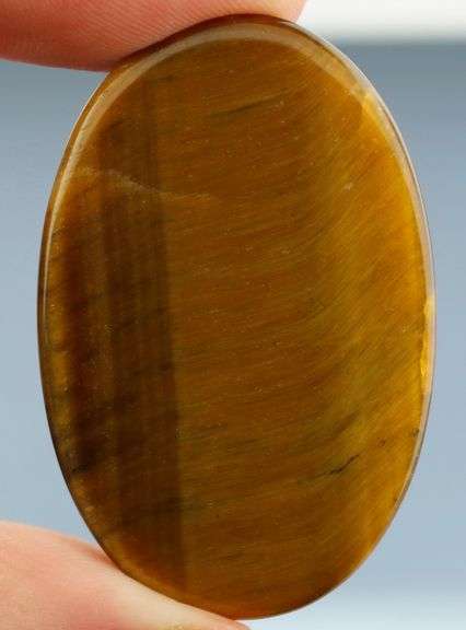 Look at that shimmer! 79.91ct Golden Tiger Eye cabochon