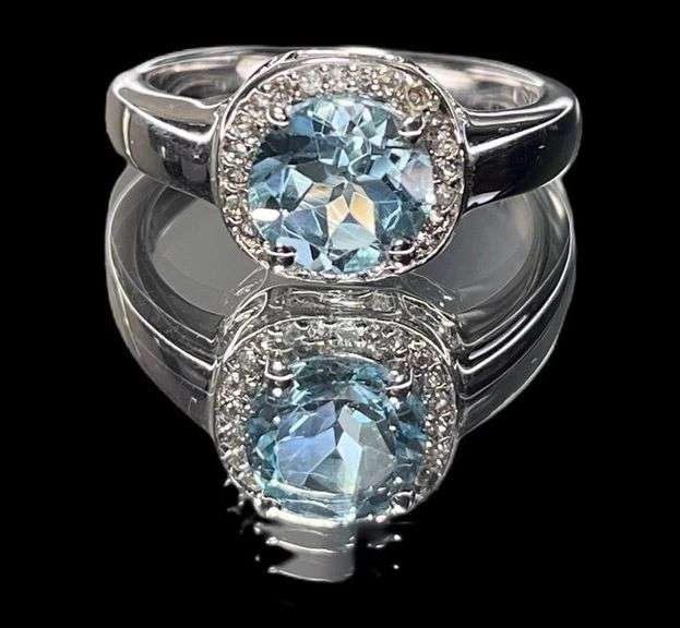 Breathtaking Rhofium Plated Natural 2.35 Ct Sky Blue Topaz Ring