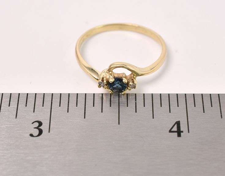 Classy Blue Sapphire And Diamond Ring in 14K Yellow Gold