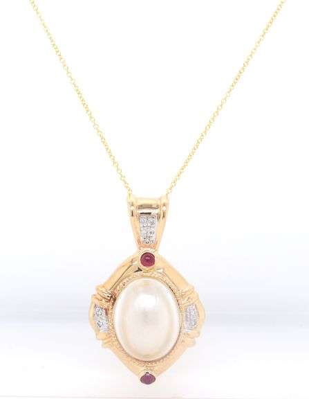 Wonderful Yellow Gold oval Mabe Pearl Enhancer with Ruby Cab and Diamond accents Necklace