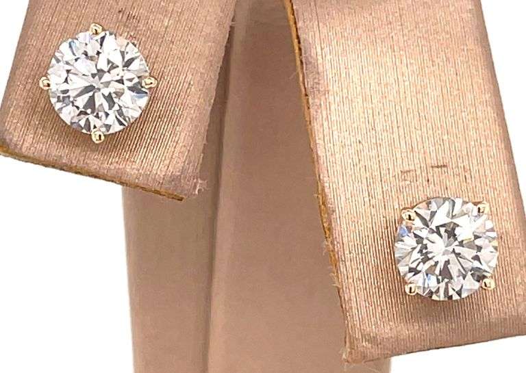 1.28 CARAT DIAMOND STUDS CRAFTED IN 14K YELLOW GOLD
