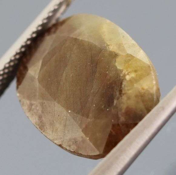 UNTREATED! Shimmering 15.06ct earth toned faceted Sapphire