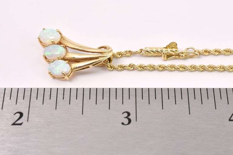 Striking Opal Pendant Necklace In 14K Yellow Gold