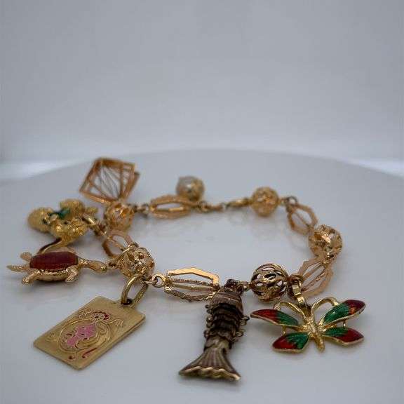 18K & 14K MIXED GOLD CHARM BRACELET