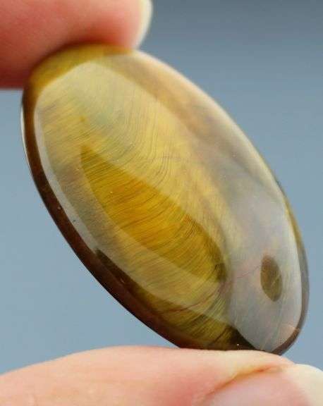 Dramatic 55.94ct Tiger Eye cabochon