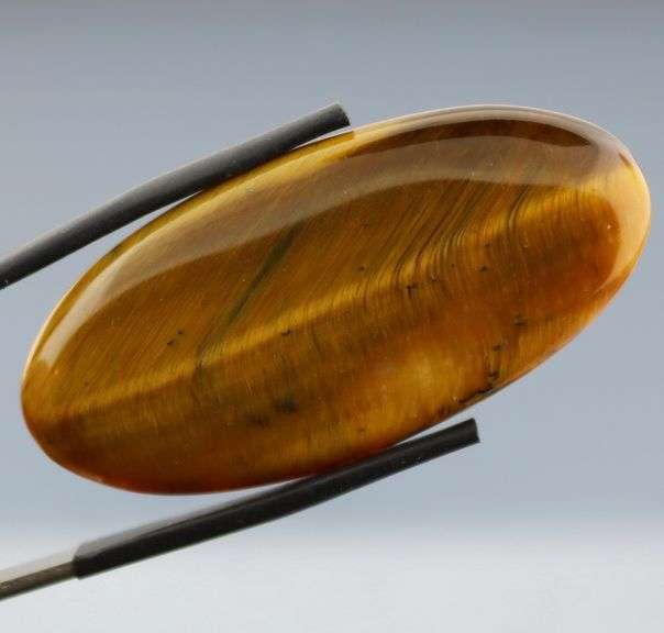 Full body shimmer! 49.27ct Golden Tiger Eye cabochon