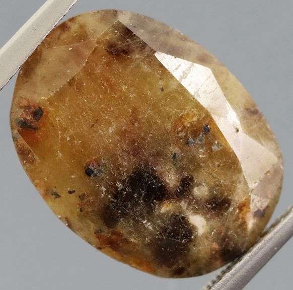 Super unique calico 13.03ct faceted Sapphire