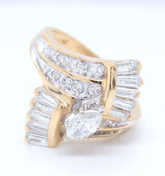 Dazzling Yellow Gold Marquois, Round and Baguette Diamond Ring