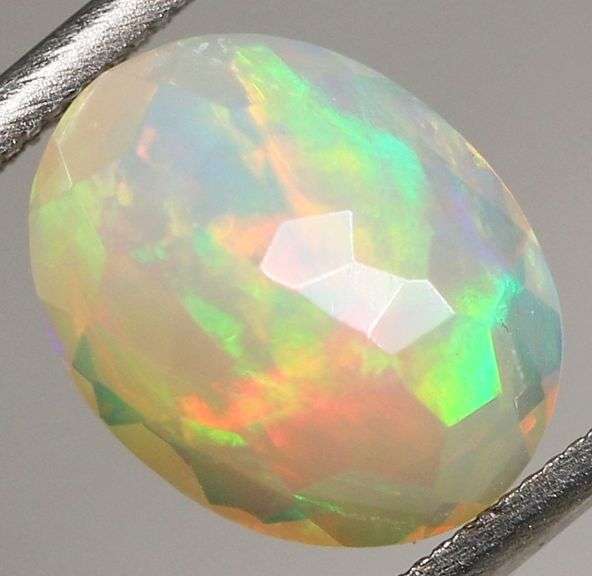 Gorgeous 2.01ct rainbow floral flashing jelly Opal