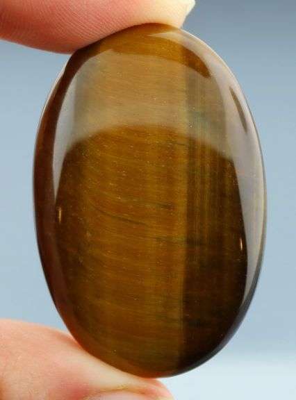Look at that shimmer! 79.91ct Golden Tiger Eye cabochon