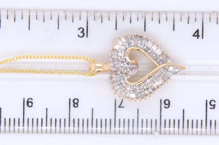 Attractive Yellow Gold Round Brilliant Cut and Baguette Open Diamond Heart Pendant on Chain