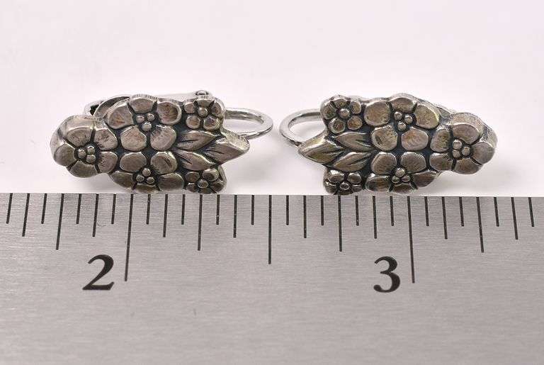 Flower Clip On Earrings In Sterling Silver