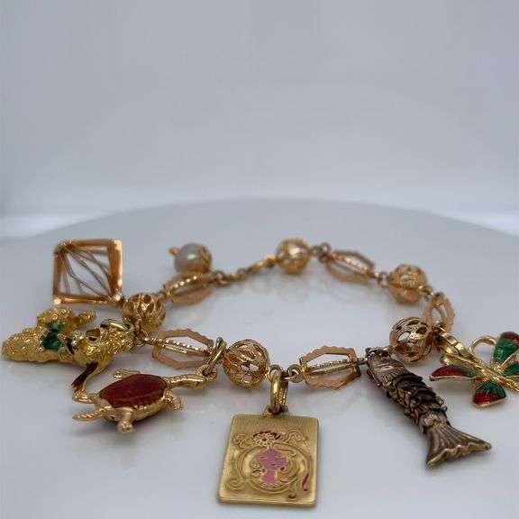 18K & 14K MIXED GOLD CHARM BRACELET