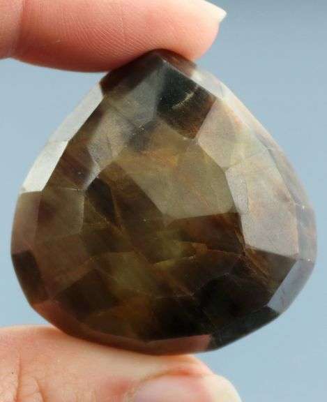 Large! 245ct earth toned faceted Sapphire