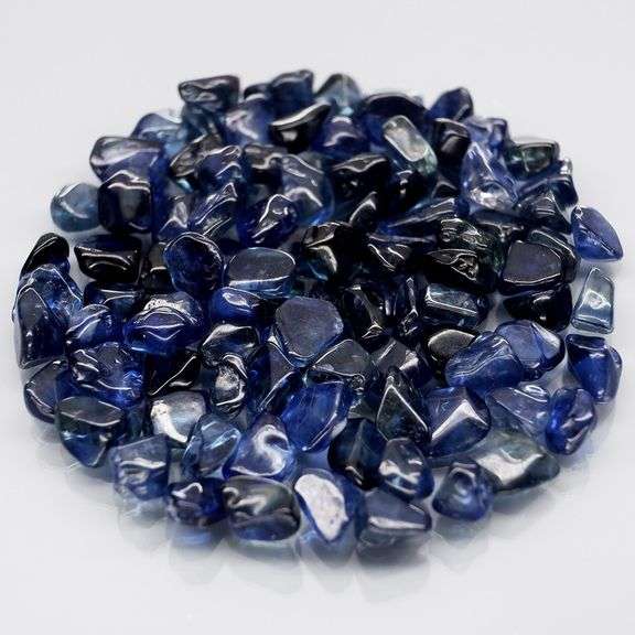 Really heavy and richly colored 30.90ct Sapphire set