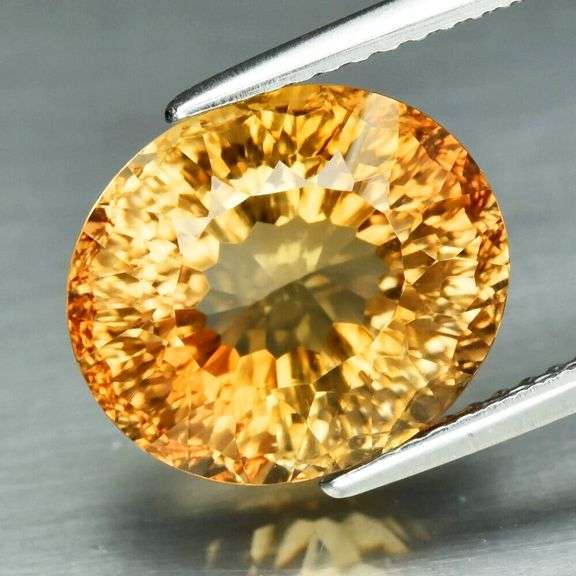 Fiery flashing 8.23ct golden Imperial Topaz